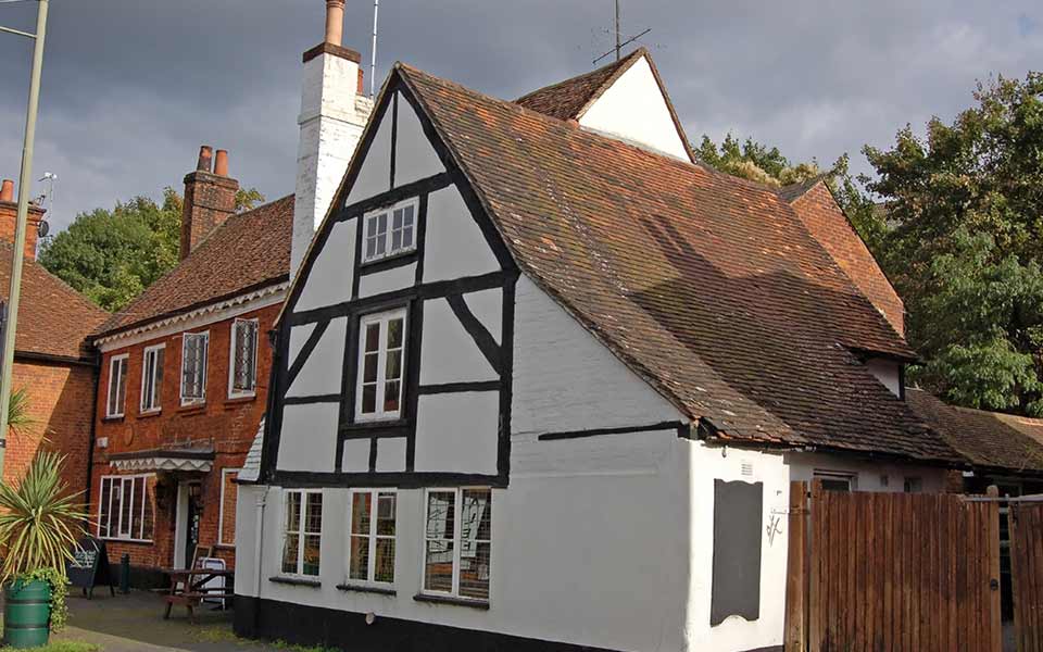 Building with steep sloped roof