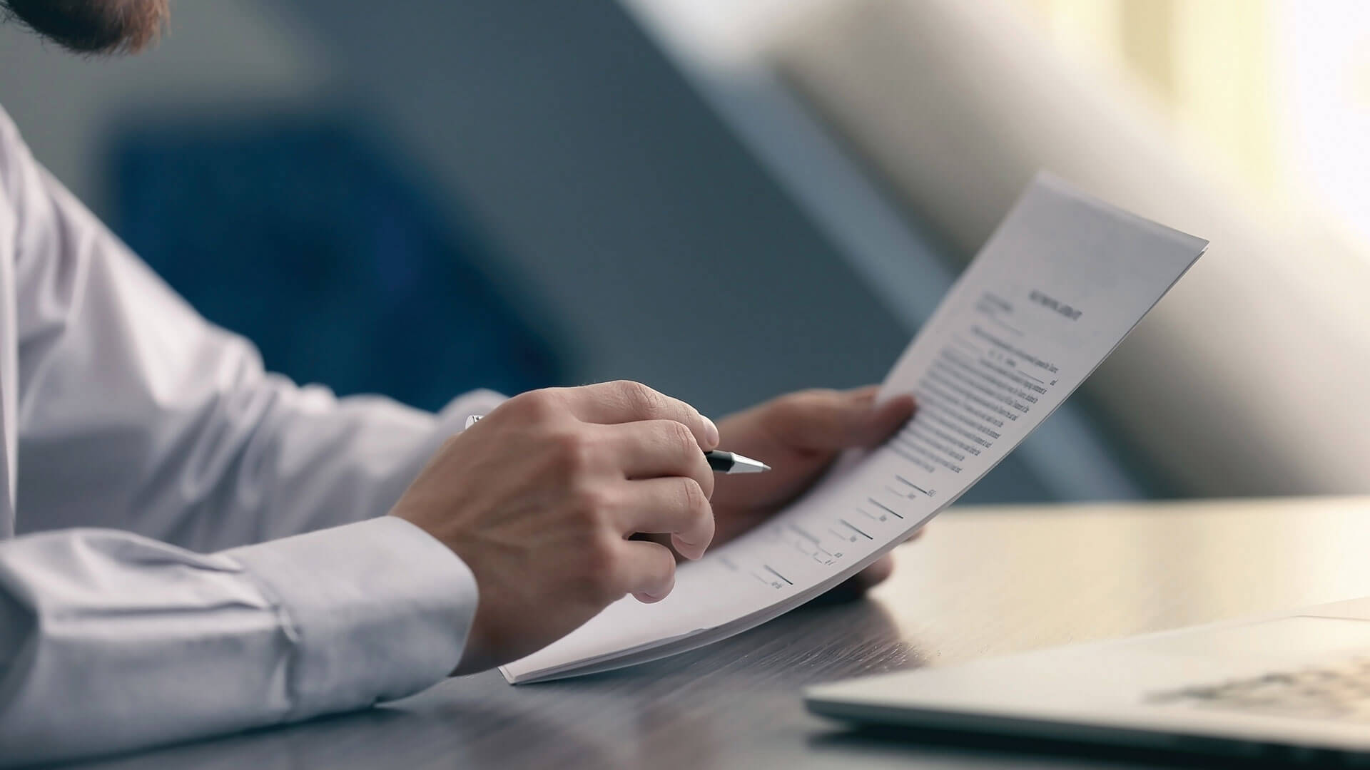 Person signing contracts